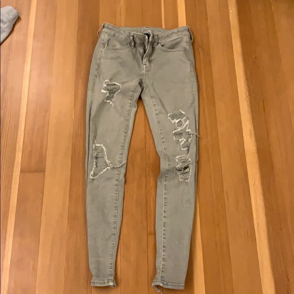 sage green american eagle skinny jeans
